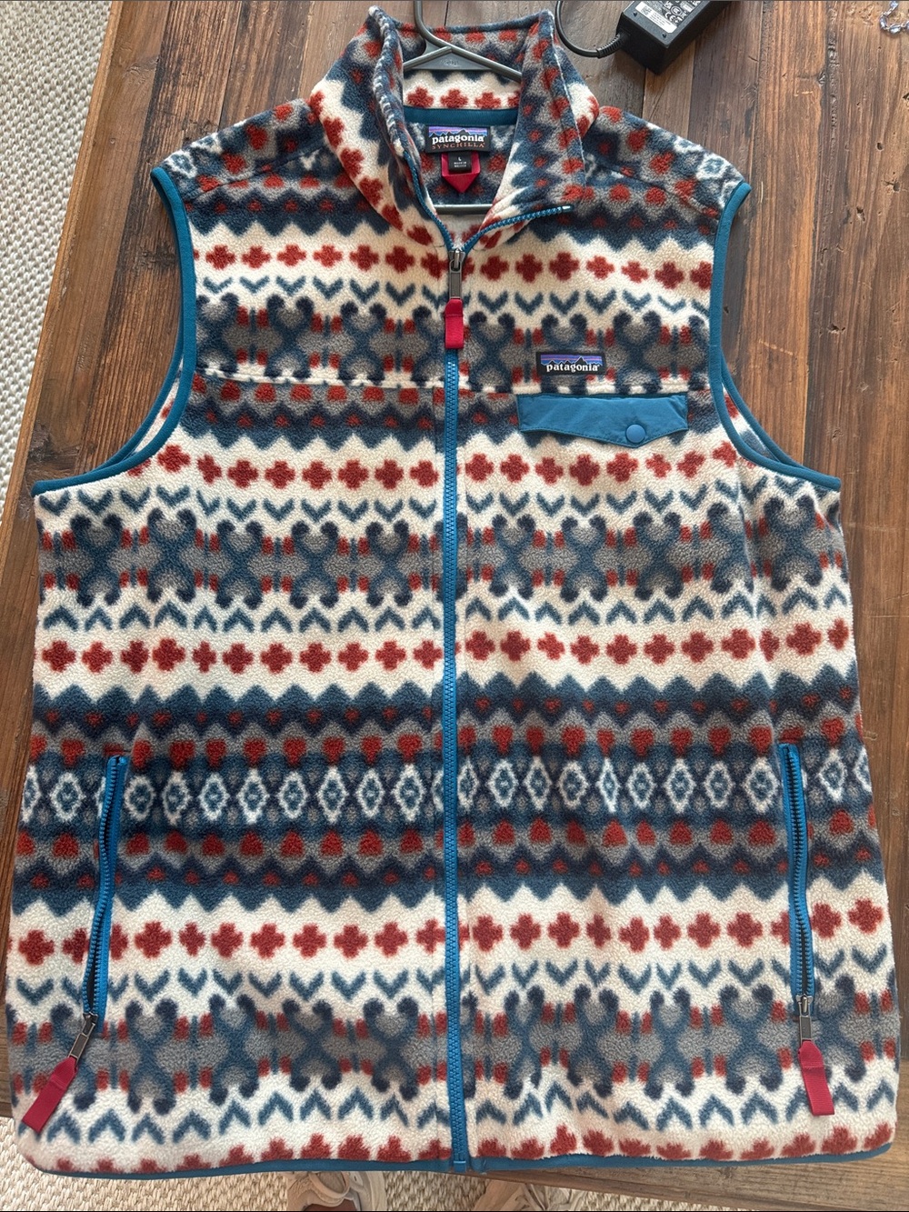 Patagonia Cream Fleece Vest with Blue & Rust Pattern